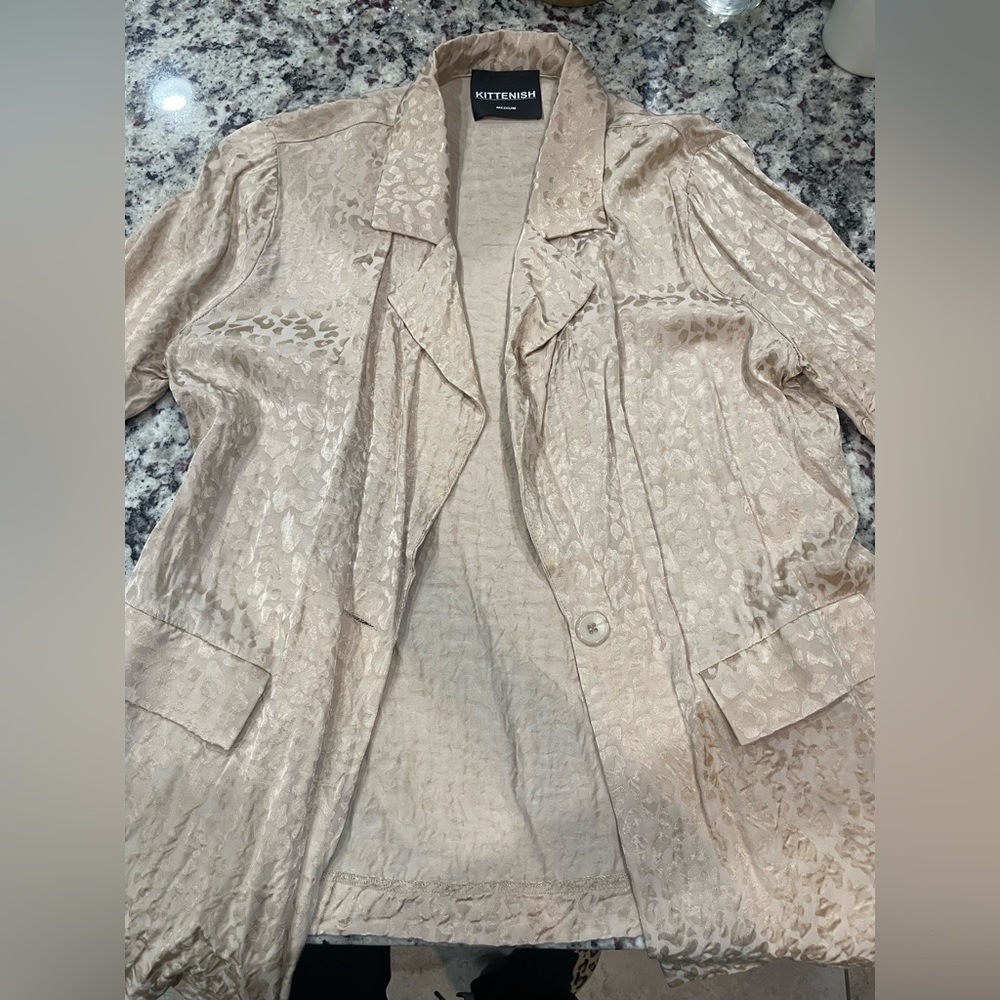 Kittenish animal print blazer